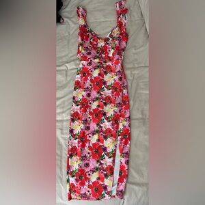 Brand new dress. Good for a wedding or event! Never worn. Tags still on!